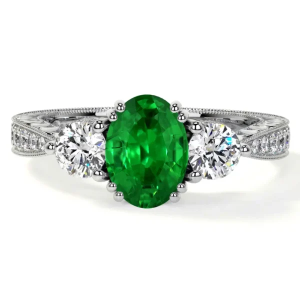 Natural Oval Cut Emerald Prong Set Three Stone Ring