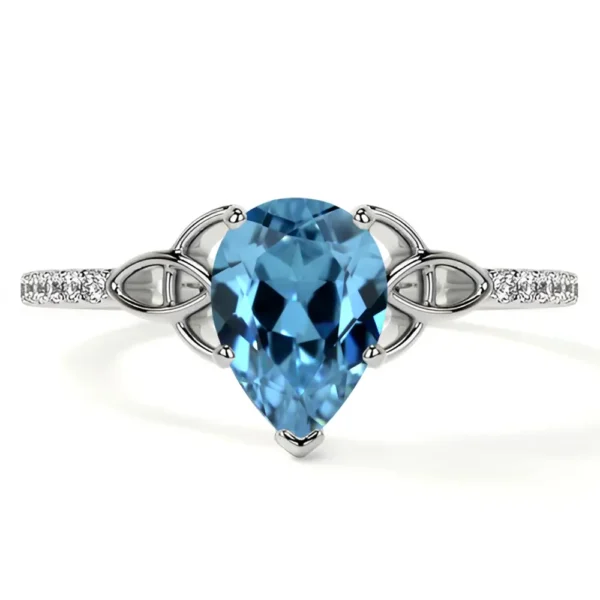 Natural Pear Shape Swiss Topaz Prong Set Celtic Ring